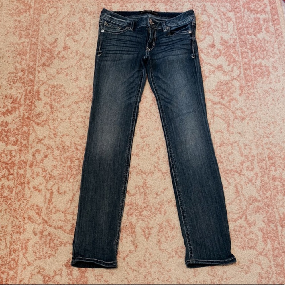 Express medium/ dark wash skinny jean 4R